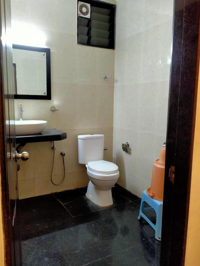 Hotel Green Park Suites Manipal Bagian luar foto
