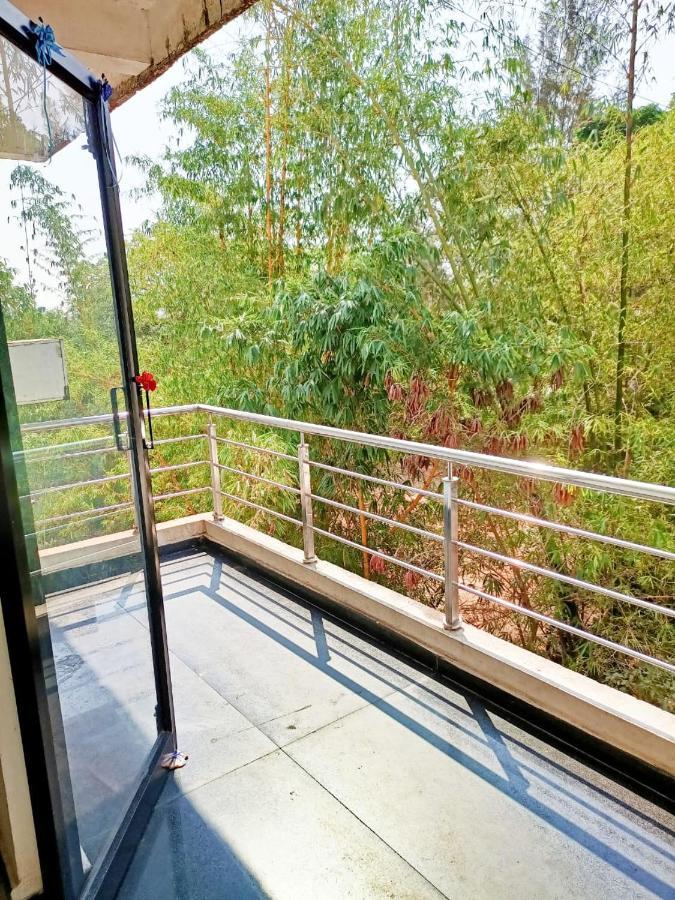 Hotel Green Park Suites Manipal Bagian luar foto