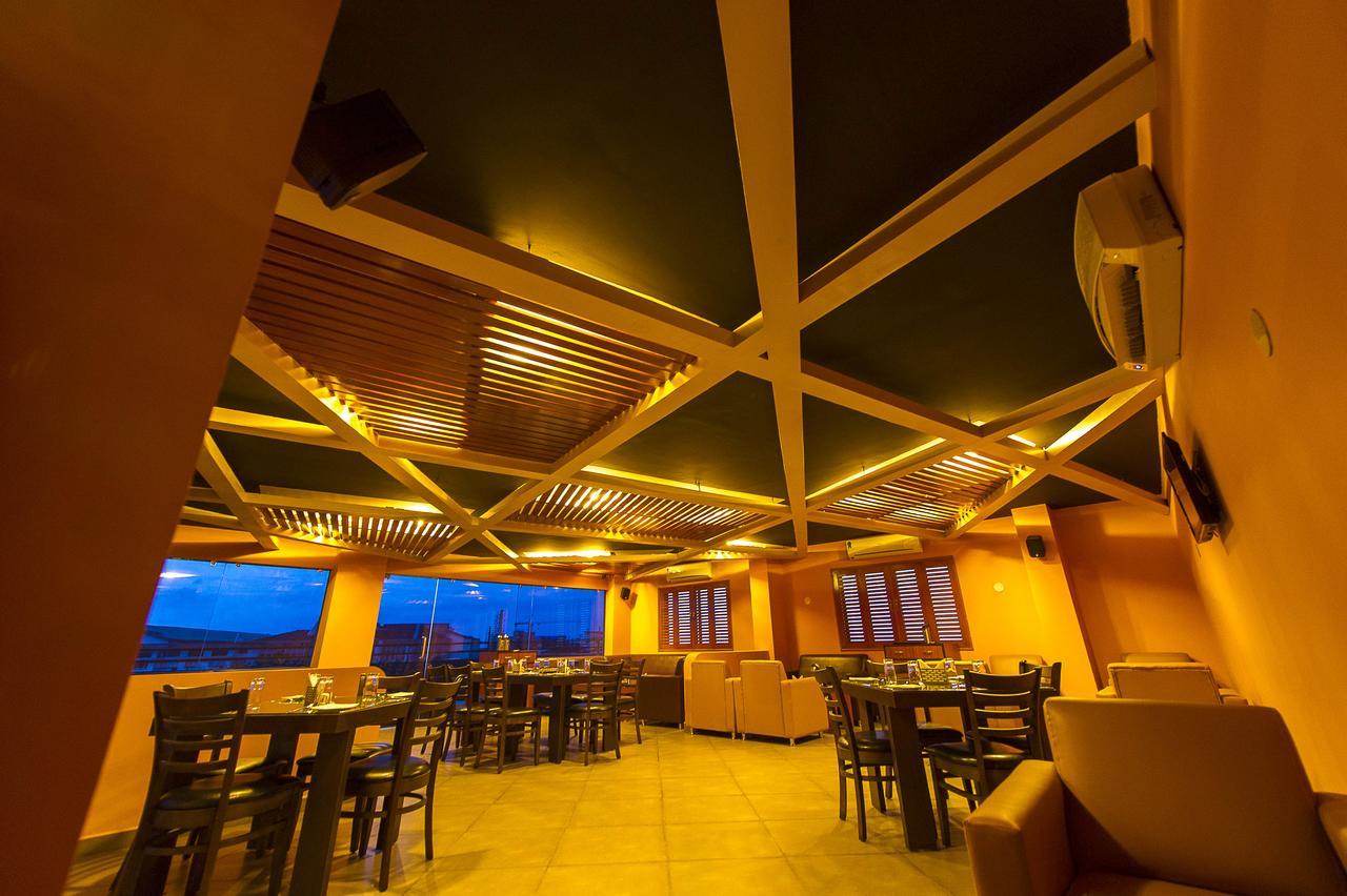 Hotel Green Park Suites Manipal Bagian luar foto