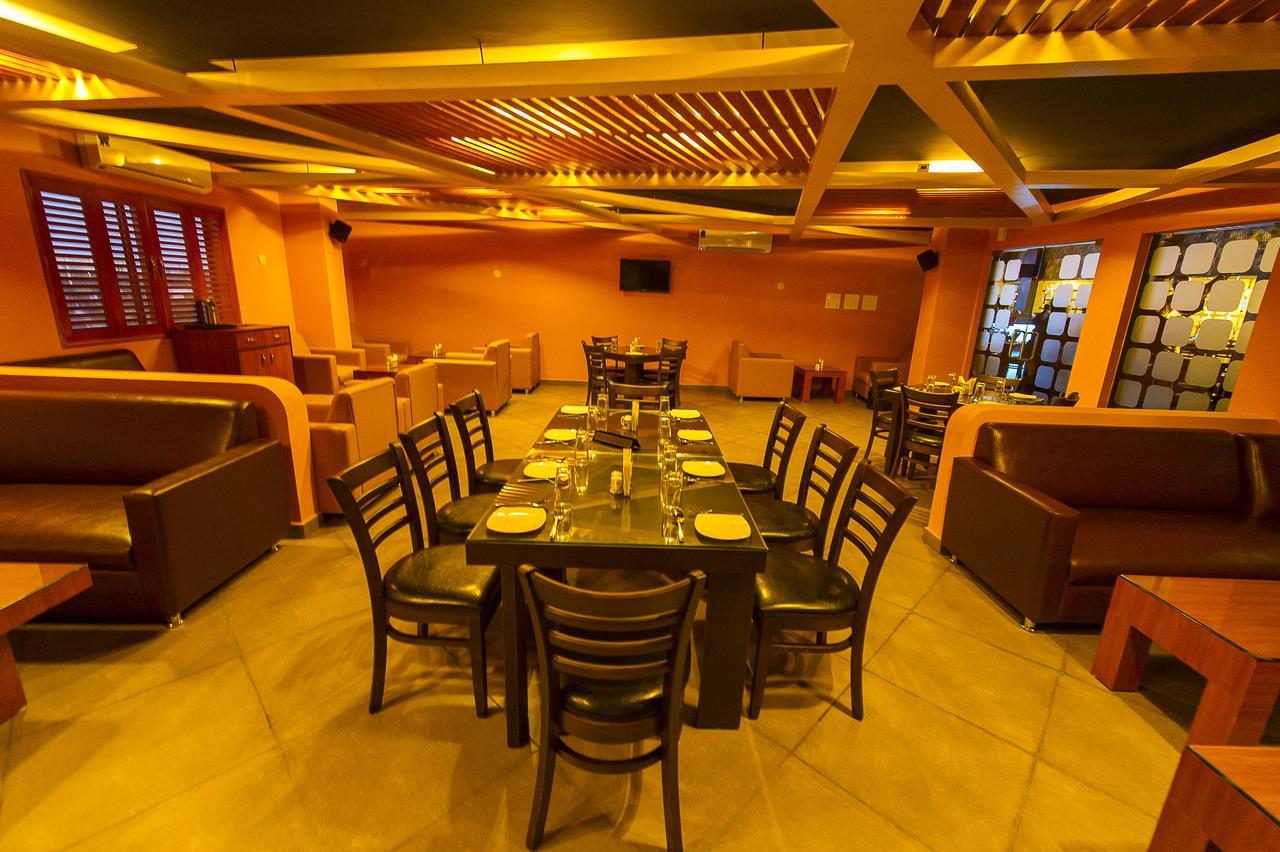 Hotel Green Park Suites Manipal Bagian luar foto
